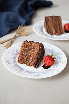 Slices of chocolate cake with strawberry