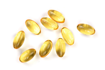 fish oil capsules isolated on white background. Top view. Flat lay pattern