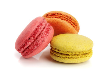 three macaroons isolated on white background closeup