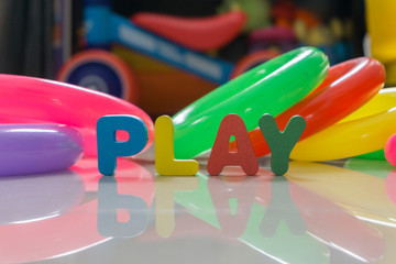 concept 'PLAY' and toys