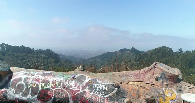 Slow Motion Grizzly Peaks Outlook Drone shot over graffiti log Berkeley hills aerial  Northern California