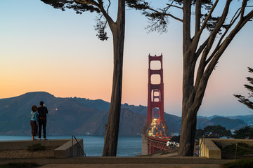 A Couple  Enjoying Sunset at Golden Gate Bridge, San Francisco