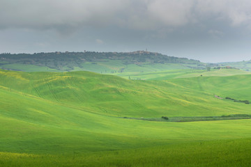 Fototapeta na wymiar Panoramic view of a spring day in the Italian rural landscape.