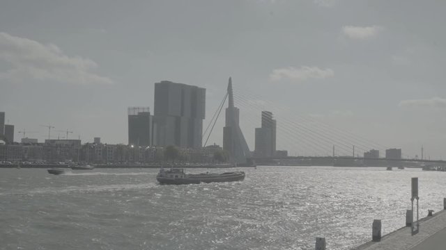Boot varend door de Maas in Rotterdam / Boat sailing through Rotterdam - Ungraded S-log footage (gives you the flexibility and dynamic range.)