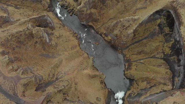 Cinematic aerial flyover of stunning Icelandic canyon.