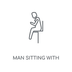 man sitting with headache icon