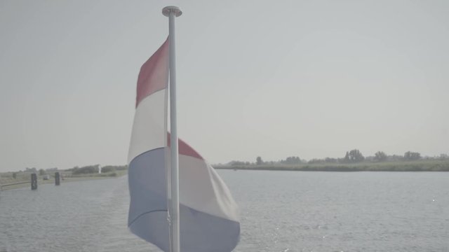 Nederlandse vlag op het water / Dutch flag on the water - Ungraded S-log footage (gives you the flexibility and dynamic range.)