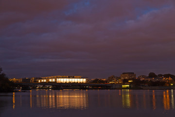 Washington DC panorama photographed from Arlington Memorial Bridge, USA. Night city skyline with reflection in quiet waters of Potomac River.