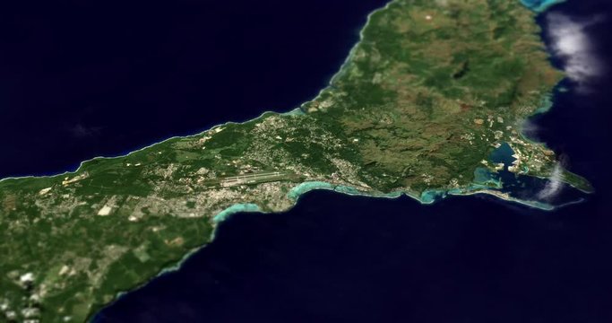 Very high-altitude circular tracking shot of Guam with tilt-shift effect. Reversible. Elements of this image furnished by NASA. 