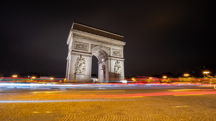 Wide Angle Night View of the arch de triomphe With Traffic Around it