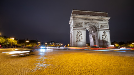 Fototapeta na wymiar Long Exposure Picture of Paris Arch de Triomphe At Night