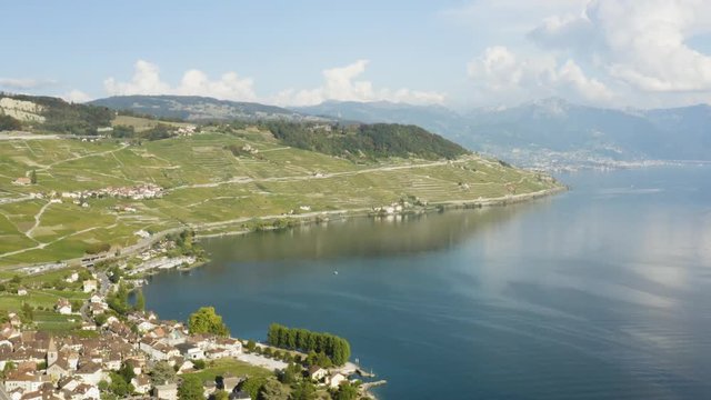 Flying high above Cully and Lake L&radic;&copy;man.
Lavaux vineyard in the background - Switzerland
Summer colors, blue mirror-like lake