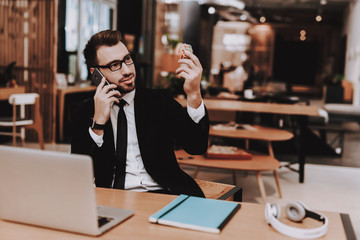 Office. Business Suit. Talking on Phone. Project.