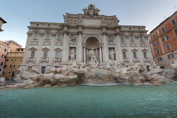 Fototapeta na wymiar Trevi fountain in the morning, Rome, Italy. Rome baroque architecture and landmark. Rome Trevi fountain is one of the main attractions of Rome and Italy