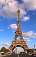 Fototapeta na wymiar Eiffel Tower and the street with few cars