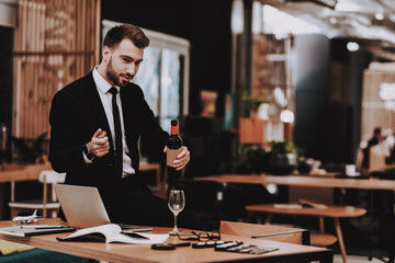 Inspiration. Glass. Bottle of Wine. Business Suit.