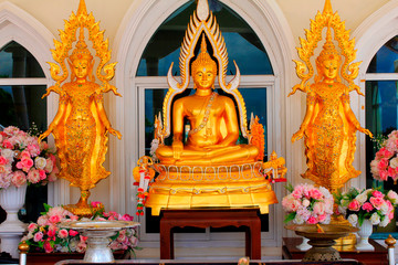 Golden idols of lord Buddha, outside the main building of Wat Prathat, Pha Sorn Kaew, in Khao Kor, Phetchabun, Thailand