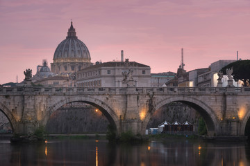 Fototapeta na wymiar Vatican City, Rome, Italy, Beautiful Vibrant Night image Panorama of St. Peter's Basilica, Ponte St. Angelo and Tiber River at Dusk in Summer. Reflection of The Papal Basilica of St. Peter