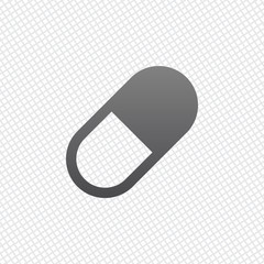 simple symbol of pill or vitamin. On grid background