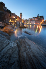 Fototapeta na wymiar One of the five towns that make up the Cinque Terre region - Vernazza. Great spring sunrise in Liguria, Italy, Europe. Splendid seascape of Mediterranean sea. Traveling concept background.