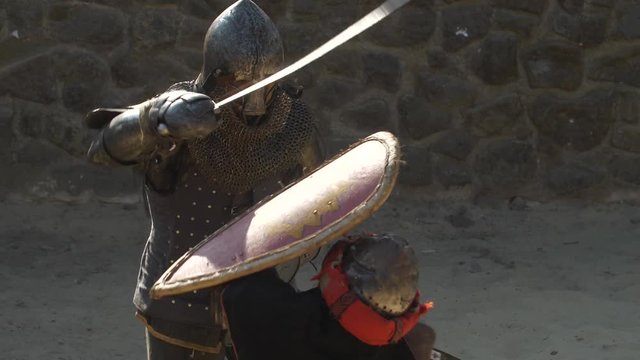 duel of knights on swords