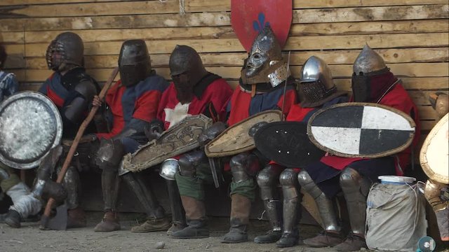 a group of knights awaiting battle