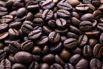 Roasted coffee beans. Brown roasted coffee beans background.