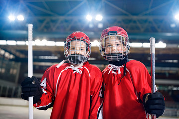 Obraz premium Ice Hockey - portrait boys players.