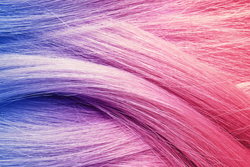 Texture of healthy blond hair as background, closeup