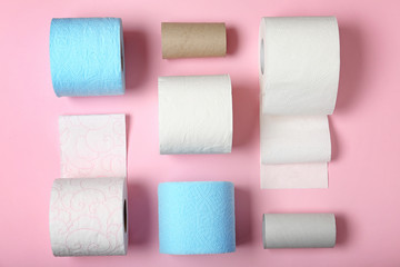 Flat lay composition with toilet paper on color background