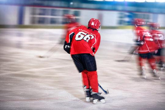 ice hockey- boy skating on the rink.