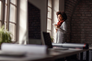 Fototapeta premium Successful business woman holding tablet.