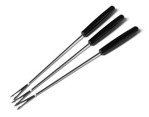 Set of fondue forks on white background. Kitchen equipment