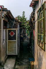 A view of a narrow alley in a traditional Beijing Hutong in China - 5