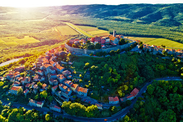 Hill town of Motovun at sunset aerial view