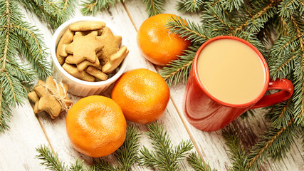 Gingerbread Cookie. NewYear. Orange tangerines. Spruce branch