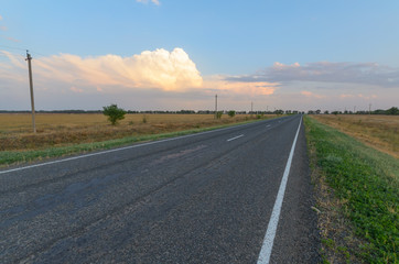 Paved road in the steppe.
