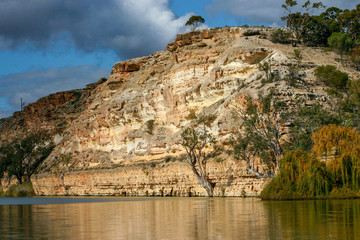 Fototapeta na wymiar Landscape view of sandstone cliffs on the banks of the Murray River in South Australia.