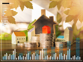 Mortgage concept by money house from the coins
