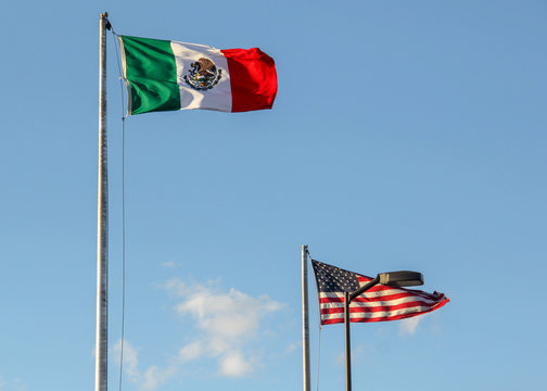 The flags of Mexico and the United States of America, marking the border between Ciudad Juarez, Mexico, and El Paso, Texas.