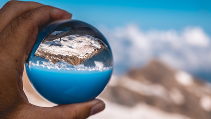 Crystal ball alpine landscape shot at Kitzsteinhorn - Salzburg - Austria