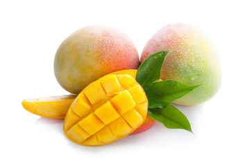Mango fruit with mango cubes and slices. Isolated on a white background.