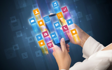 Female hand using smartphone with colorful angular fast switching application icons around