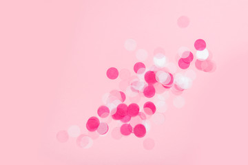 Colorful Confetti on pink Background