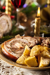 Traditional italian porchetta on festive table