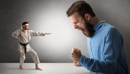 Giant hipster man yelling at a small karate man