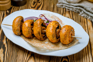 Skewers of mushrooms