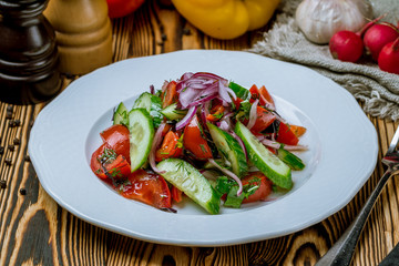 Vegetable salad with tomatoes and cucumbers