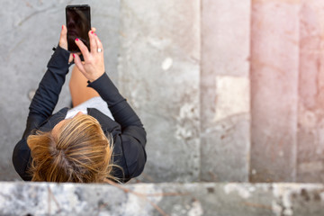   Woman using her cell phone