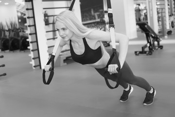 Obraz na płótnie Canvas attractive young woman in fitness sport club